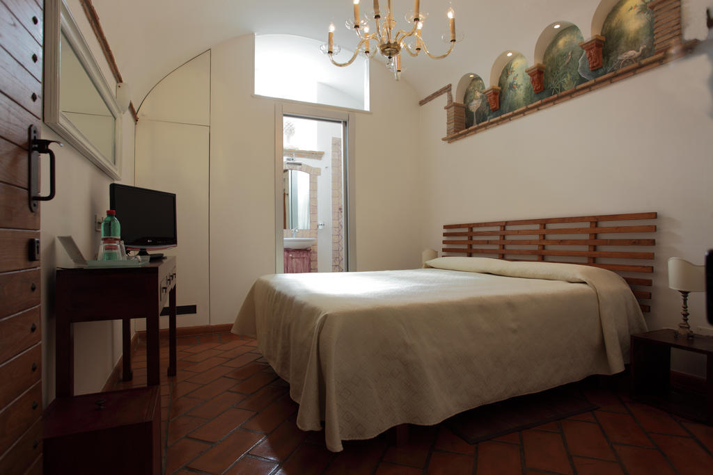 I Capocci Hotel Róma Szoba fotó